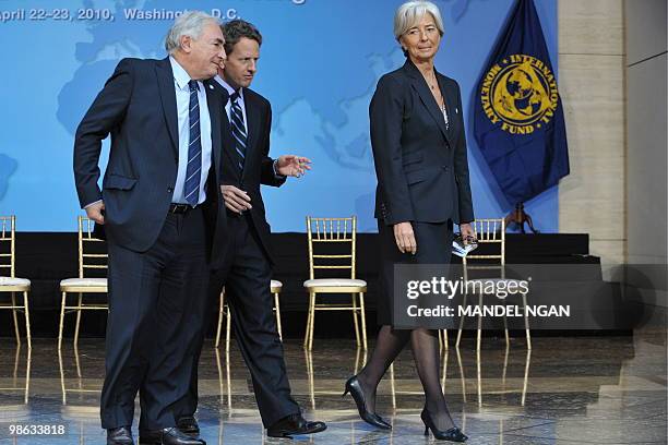 International Monetary Fund Managing Director Dominique Strauss-Kahn chats with US Treasury Secretary Tim Geithner and France's Finance Minister...