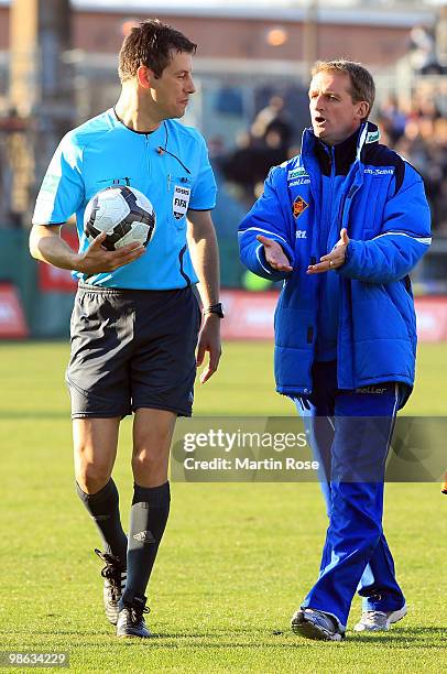 Petrik Sander , head coach of Koblenz argues with referee Wolfgang Stark during the Second Bundesliga match between FC St. Pauli and TuS Koblenz at...