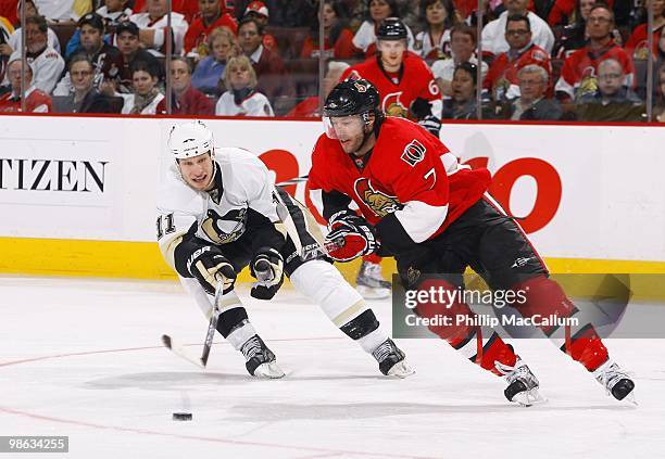 Matt Cullen of the Ottawa Senators and Jordan Staal of the Pittsburgh Penguins chase down the puck in Game 4 of the Eastern Conference Quaterfinals...