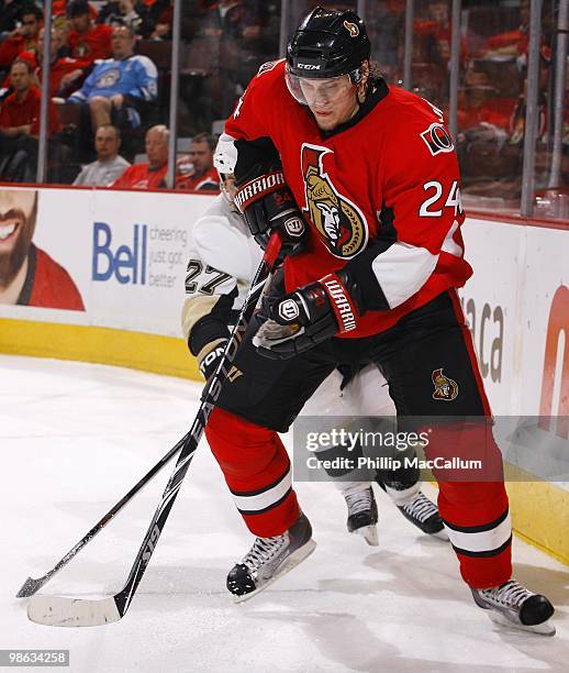 Anton Volchenkov of the Ottawa Senators plays the puck against the Pittsburgh Penguins in Game 4 of the Eastern Conference Quaterfinals during the...