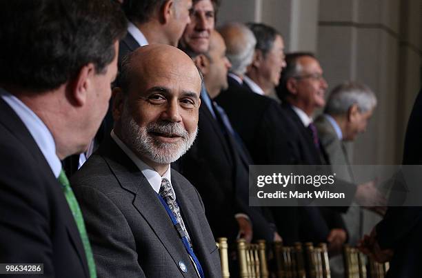 Chairman of the Federal Reserve Ben Bernanke participates in a group photo at the International Monetary Fund on April 23, 2010 in Washington, DC....