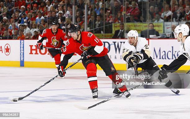 Jason Spezza of the Ottawa Senators skates with the puck against the Pittsburgh Penguins in Game 4 of the Eastern Conference Quaterfinals during the...