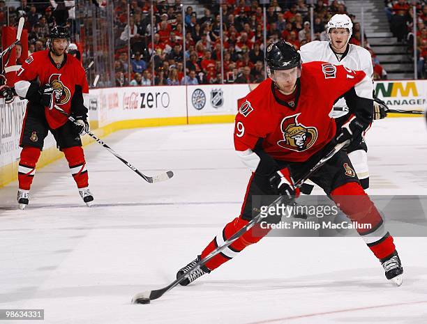 Jason Spezza of the Ottawa Senators skates with the puck against the Pittsburgh Penguins in Game 4 of the Eastern Conference Quaterfinals during the...