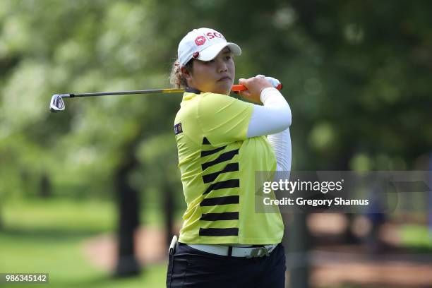 Ariya Jutanugarn of Thailand hits her second shot on the ninth hole during the first round of the 2018 KPMG PGA Championship at Kemper Lakes Golf...