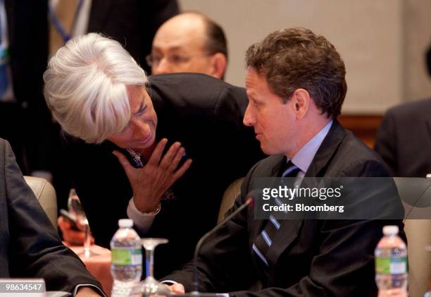 Timothy Geithner, U.S. Treasury secretary, right, talks with Christine Lagarde, France's finance minister, during the Group of 20 Finance Ministers...