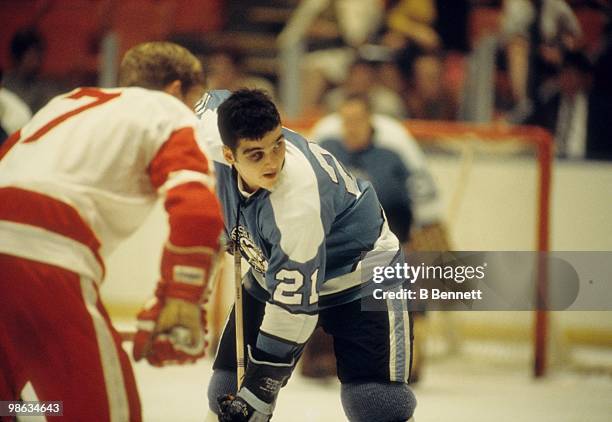 Michel Briere of the Pittsburgh Penguins takes the faceoff against Garry Unger of the Detroit Red Wings during an NHL game circa 1969-70 at the...