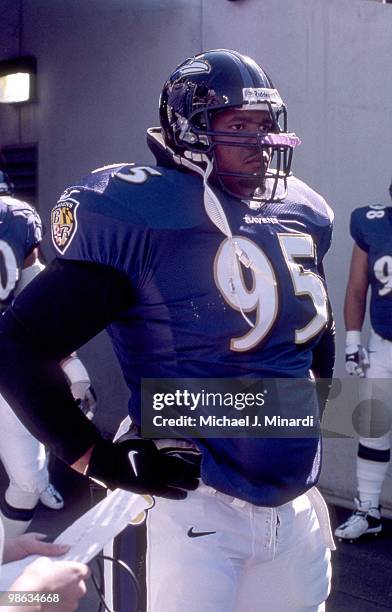 Defensive Tackle Sam Adams of the Baltimore Ravens gets ready-come on the field in a NFL game against the Tennessee Titans at PSINet Ravens Stadium...