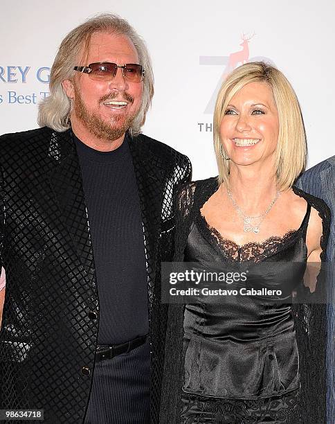 Barry Gibb and Olivia Newton-John attends the "Pink and Blue for Two" event at Raleigh Hotel on April 22, 2010 in Miami Beach, Florida.