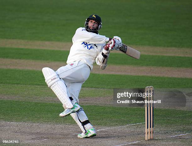 Hashim Amla of Nottinghamshire hits the winning runs during the LV County Championship match between Nottinghamshire and Somerset at Trent Bridge on...
