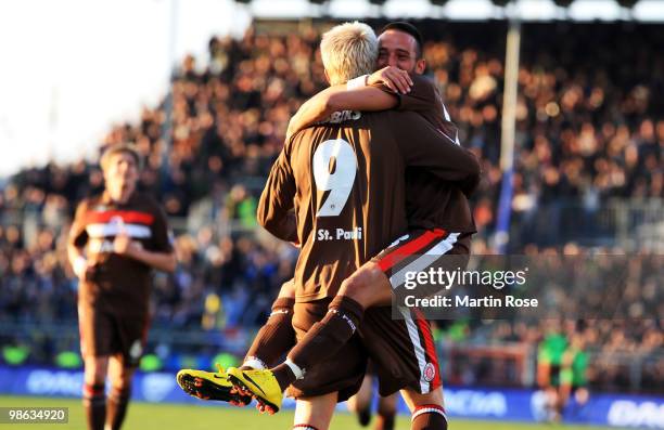 Marius Ebbers of St. Pauli celebrates with team mate Deniz Naki after scoring his team's 4th goal during the Second Bundesliga match between FC St....