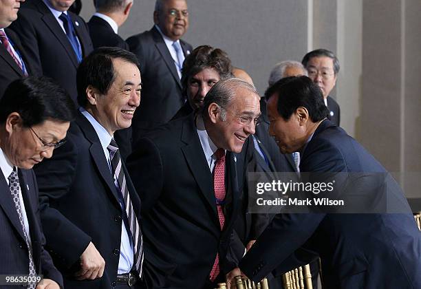 South Korean Finance Minister, Yoon Jeung-hyun talks with Secretary-General, Angel Gurria of the Organization for Economic Cooperation and...