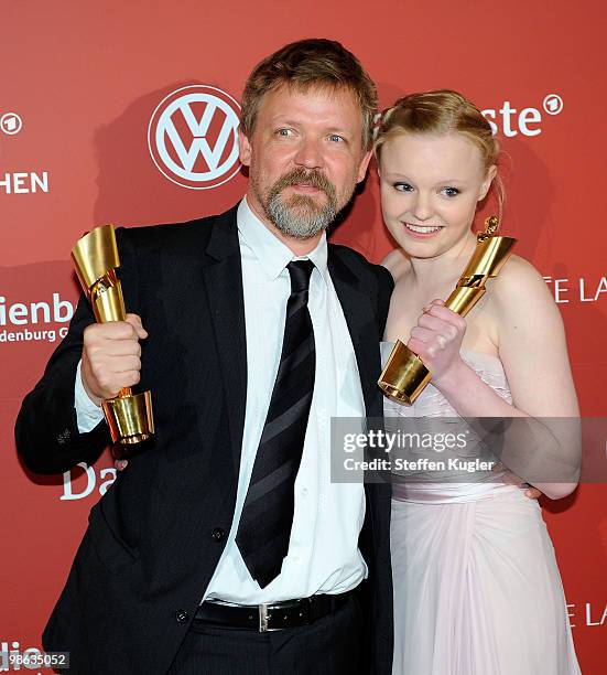 Actor Justus von Dohnanyi and actress Maria Victoria Dragus hold her Lola for best supporting actors male and female at the 60th German Film Prize...