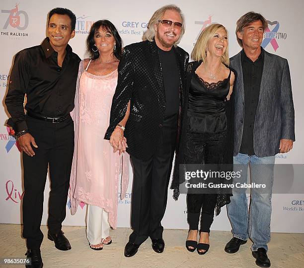 Singer Jon Secada,Linda Gibb,Barry Gibb,Olivia Newton-John and husband John Easterling attends the "Pink and Blue for Two" event at Raleigh Hotel on...