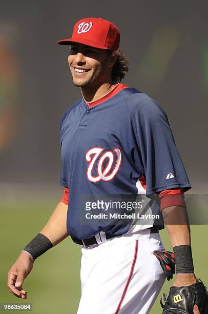 Mike Morse of the Washington Nationals looks on during batting practice of a baseball game against the Colorado Rockies on April 19, 2010 at...