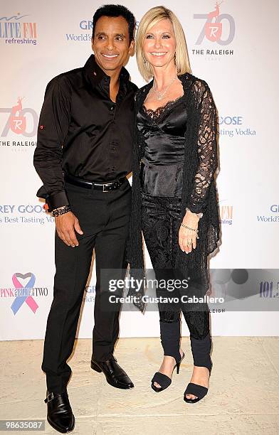 Singer Jon Secada and Olivia Newton-John attends the "Pink and Blue for Two" event at Raleigh Hotel on April 22, 2010 in Miami Beach, Florida.