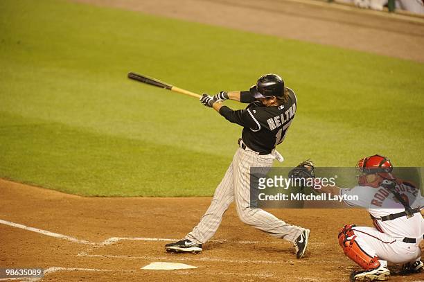 Todd Helton of the Colorado Rockies takes a swing during a baseball game against the Washington Nationals on April 19, 2010 at Nationals Park in...