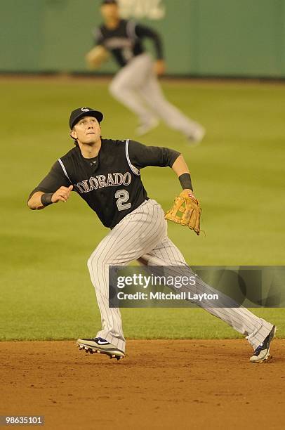 Troy Tulowittzki of the Colorado Rockies prepares to feild a pop fly during a baseball game against the Washington Nationals on April 19, 2010 at...