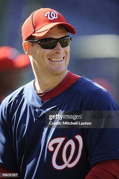 Josh Willingham of the Washington Nationals looks on during batting practice of a baseball game against the Colorado Rockies on April 19, 2010 at...