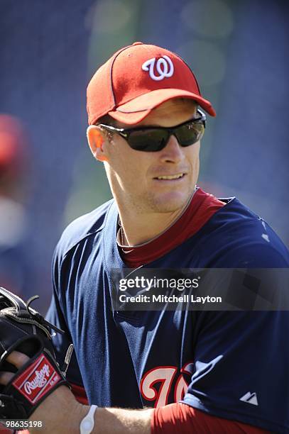 Josh Willingham of the Washington Nationals looks on during batting practice of a baseball game against the Colorado Rockies on April 19, 2010 at...