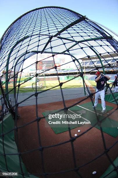 Adam Dunn of the Washington Nationals takes swings during batting practice of a baseball game against the Colorado Rockies on April 19, 2010 at...