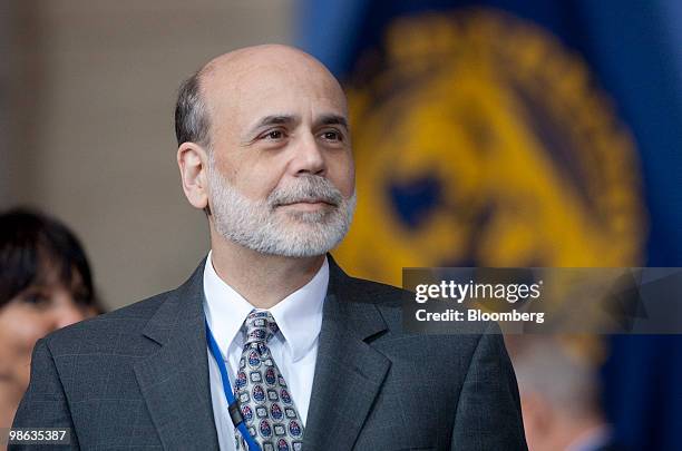 Ben S. Bernanke, chairman of the U.S. Federal Reserve, leaves after a group photo during the Group of 20 Finance Ministers and Central Bank...