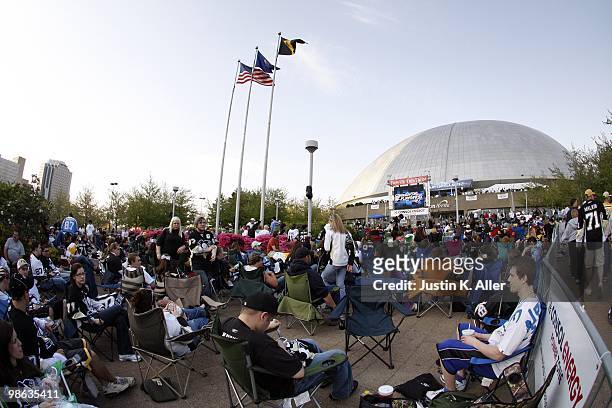 Pittsburgh Penguins fans support their team by collecting outside to watch the game against the Ottawa Senators on a large screen before Game Five of...