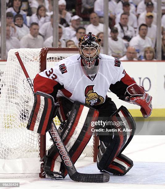 Pascal Leclaire of the Ottawa Senators protects the net against the Pittsburgh Penguins in Game Five of the Eastern Conference Quarterfinals during...