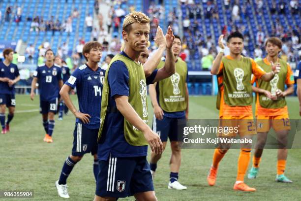 Keisuke Honda of Japan team celebrates 2nd place break during the 2018 FIFA World Cup Russia group H match between Japan and Poland at Volgograd...