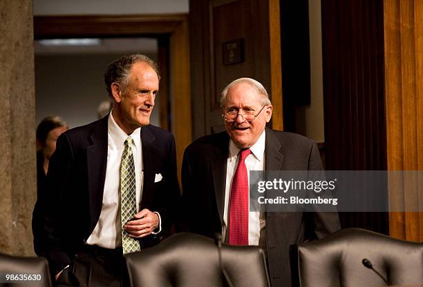 Democratic Senators Ted Kaufman of Delaware, left and Carl Levin of Michigan, talk before a Senate Homeland Security and Governmental Affairs...