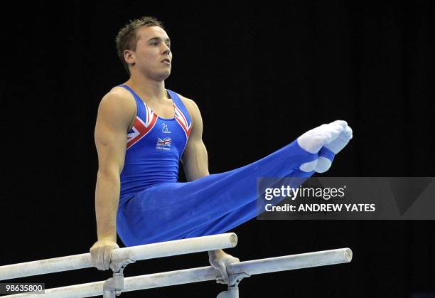 Daniel Keatings of Great Britain performs on the Parallel Bars during the men's senior qualification round, in the European Artistic Gymnastics Team...