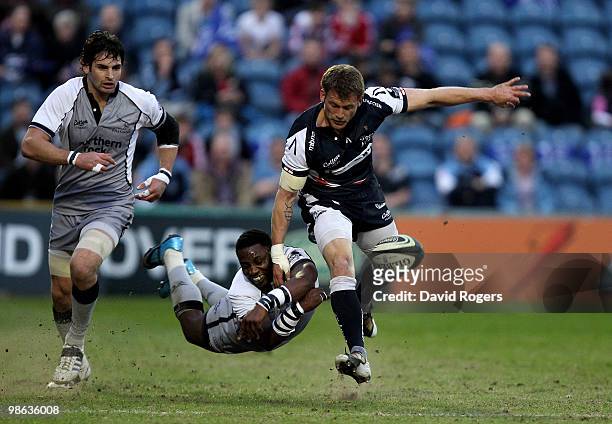 Mark Cueto of Sale is beaten to the ball by Gcobani Bobo during the Guinness Premiership match between Sale Sharks and Newcastle Falcons at Edgeley...
