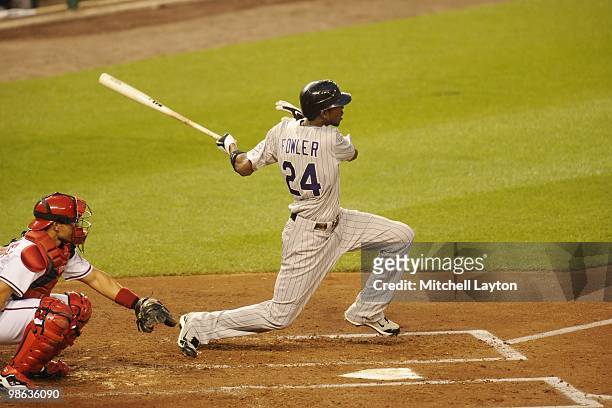 Dexter Fowler of the Colorado Rockies takes a swing during a baseball game against the Washington Nationals on April 20, 2010 at Nationals Park in...