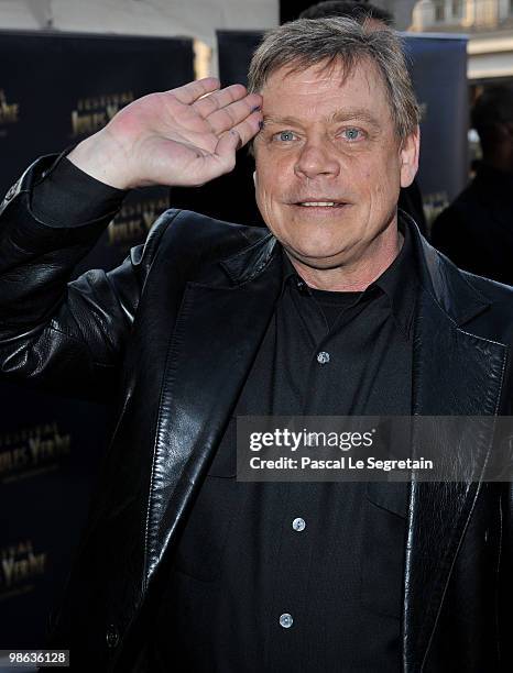 Actor Mark Hamill waves as he attends a Tribute to Star Wars V during the 18th Adventure Film Festival at Le Grand Rex on April 23, 2010 in Paris,...