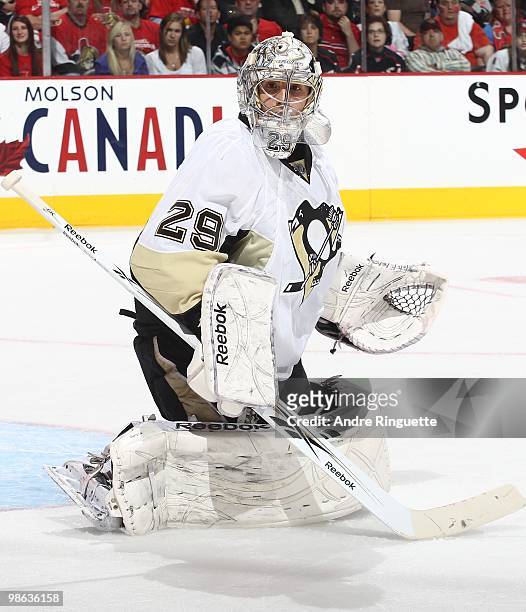 Marc-Andre Fleury of the Pittsburgh Penguinsguards his net against the Ottawa Senators in Game Four of the Eastern Conference Quarterfinals during...