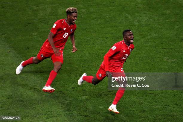 Jose Luis Rodriguez of Panama celebrates with teammate Ricardo Avila his team's first goal, an own goal by Yassine Meriah of Tunisia, during the 2018...