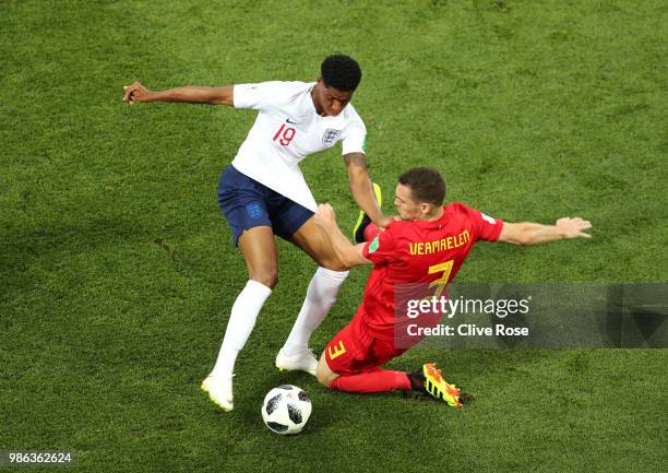 Thomas Vermaelen of Belgium tackles Marcus Rashford of England during the 2018 FIFA World Cup Russia group G match between England and Belgium at...