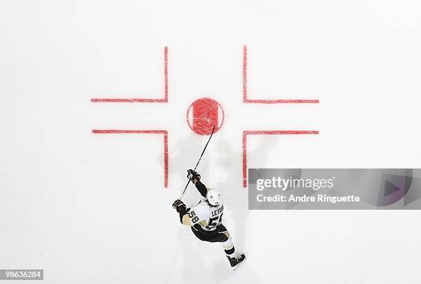 Kris Letang of the Pittsburgh Penguins shoots the puck against the Ottawa Senators in Game Four of the Eastern Conference Quarterfinals during the...
