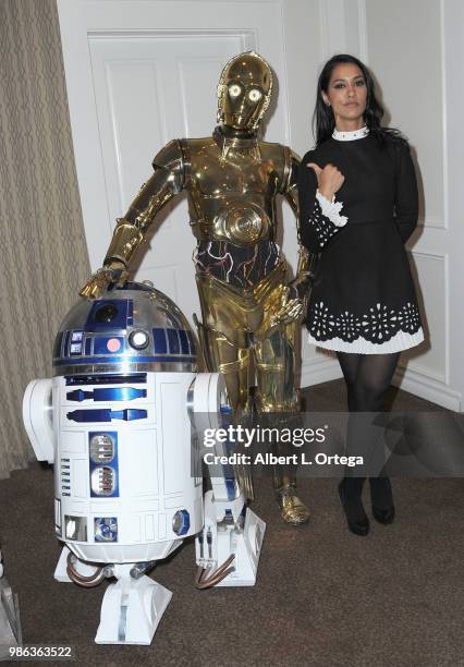 Actress Janina Gavankar poses with C3PO and R2D2 at the After Party at the Academy Of Science Fiction, Fantasy & Horror Films' 44th Annual Saturn...