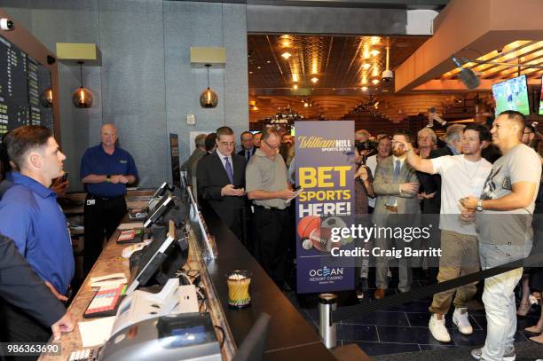 Mark Wahlberg places ceremonial first bet at William Hill Sports Book on June 28, 2018 in Atlantic City, New Jersey.