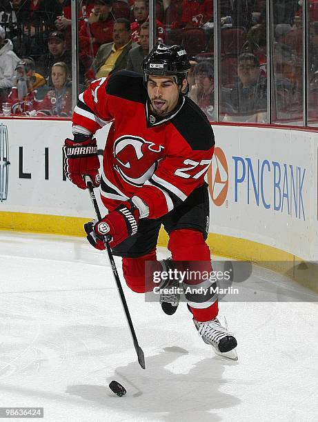 Mike Mottau of the New Jersey Devils plays the puck against the Philadelphia Flyers in Game Five of the Eastern Conference Quarterfinals during the...