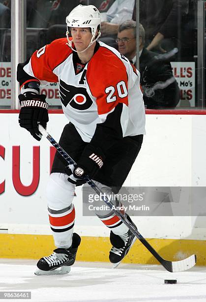 Chris Pronger of the Philadelphia Flyers plays the puck against the New Jersey Devils in Game Five of the Eastern Conference Quarterfinals during the...