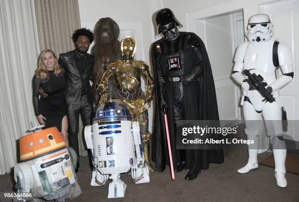 Actor Echo Kellum poses with Chewbacca, C3PO, Darth Vader, Storm Trooper, Chopper and R2D2 at the After Party at the Academy Of Science Fiction,...