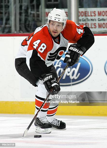 Danny Briere of the Philadelphia Flyers plays the puck against the New Jersey Devils in Game Five of the Eastern Conference Quarterfinals during the...