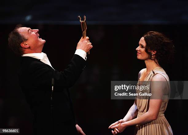 Burghart Klaussner receives his Lola award during the German film award Gala at Friedrichstadtpalast on April 23, 2010 in Berlin, Germany.