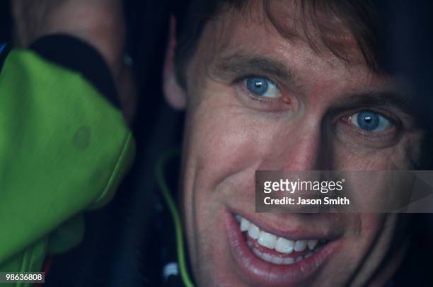 Carl Edwards, driver of the Aflac Ford, sits in his car during practice for the NASCAR Sprint Cup Series Aaron's 499 at Talladega Superspeedway on...