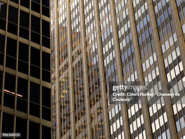 facades in glasses of two towers - chasseur stock-fotos und bilder