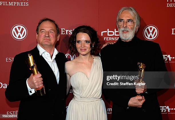 Actor Burghart Klaussner, Michael Haneke and actress Karoline Herfurth receive Lolas during the 60th German Film Prize awards Gala at...