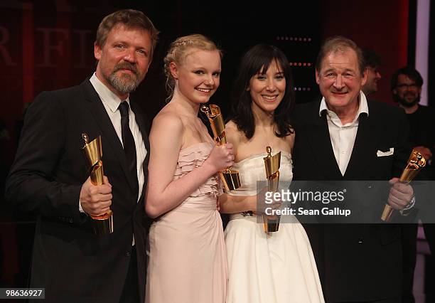 Justus von Dohnanyi, Maria Victoria Dragus, Sibel Kekilli and Burghart Klaussner pose the Lola award after the German film award Gala at...