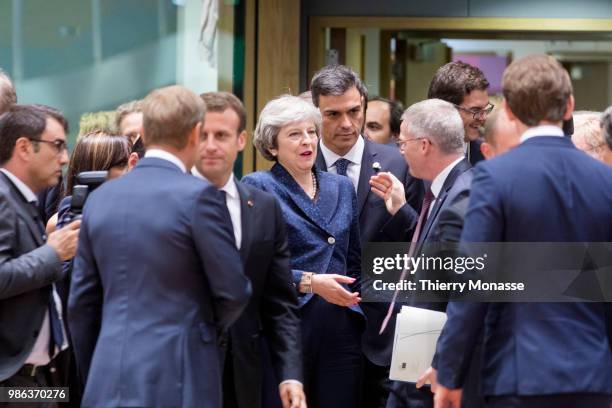 President of the European Council Donald Franciszek Tusk is talking with the French President Emmanuel Macron, the Prime Minister of the United...