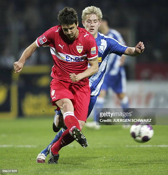 Stuttgart's Serbian midfielder Zdravko Kuzmanovic and Bochum's midfielder Lewis Holtby vie for the ball during the German first division Bundesliga...